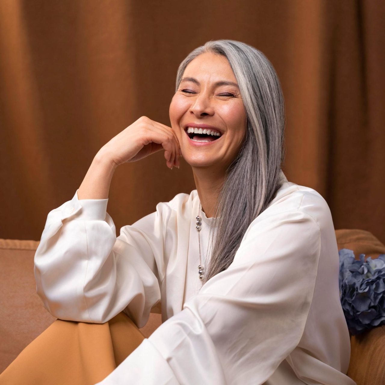 elderly woman laughing